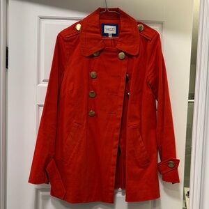 Vibrant Red Trench Coat with Gold Accents